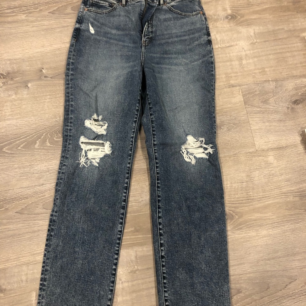 Super High Waisted Medium Wash Ripped Modern Straight Jeans.  Size 10